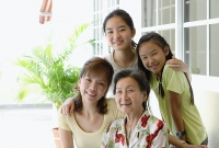 Three generation family, looking at camera, smiling - Asia Images Group