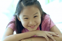 Portrait of a young girl, smiling - Asia Images Group