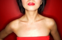 Woman in red tube tope with red lipstick - Asia Images Group