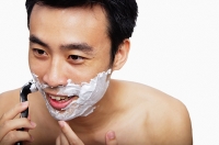 Man shaving - Asia Images Group