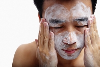 Man with foam on face - Asia Images Group