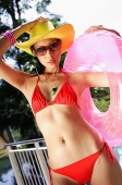 Woman in red bikini, sunglasses and hat - Asia Images Group