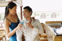Couple toasting with drinks - Asia Images Group