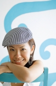 Young woman wearing beret, looking at camera - Asia Images Group