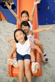 Girls on a slide - Asia Images Group