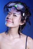 Young woman with wet hair and goggles - Asia Images Group