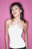 Young woman in sleeveless top, looking at camera - Asia Images Group