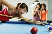 Women playing pool - Asia Images Group