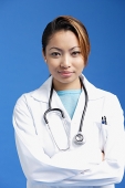 Female doctor standing with arms crossed - Asia Images Group