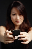 Woman holding teacup, selective focus - Asia Images Group