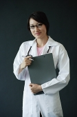 Female doctor smiling at camera - Asia Images Group