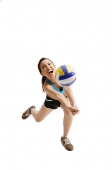 Young woman hitting volleyball - Asia Images Group