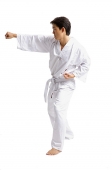 Young man practicing martial arts - Asia Images Group