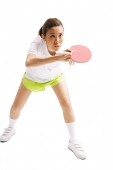 Young woman with table tennis racket, studio shot - Asia Images Group