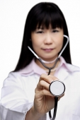Doctor with stethoscope, selective focus - Asia Images Group