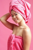 Woman wearing pink towel - Asia Images Group