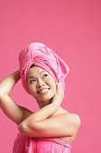 Woman wearing pink turban, looking away - Asia Images Group
