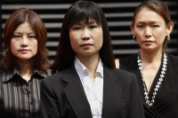 Businesswomen in a row - Asia Images Group
