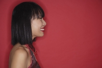 Woman with bob haircut, smiling, side view - Asia Images Group