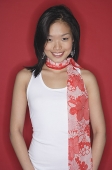 Woman in white top and scarf, portrait - Asia Images Group
