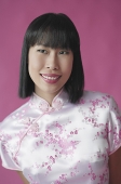 Woman in cheongsam, portrait - Asia Images Group