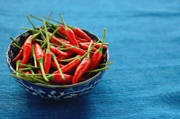Still life of bowl of chilies - Asia Images Group