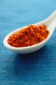 Still life of spoon with chili powder - Asia Images Group