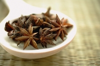 Star Anise in spoon, still life, close-up - Asia Images Group