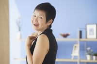Mature woman smiling at camera - Asia Images Group