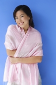 Young woman with scarf, smiling - Asia Images Group