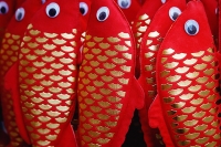 Red paper fish, Chinese New Year decorations - Asia Images Group