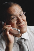 Senior man with mobile phone - Asia Images Group