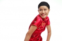Young woman in cheongsam looking away - Asia Images Group
