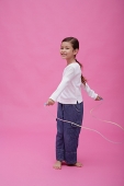 Girl with skipping rope - Asia Images Group