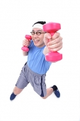 Man using dumbbells, high angle view - Asia Images Group