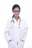 Doctor in lab coat, smiling at camera - Asia Images Group