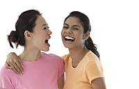 Two women laughing - Asia Images Group