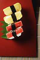 4 pieces of sushi, kanikama and tamago nigiri - Asia Images Group