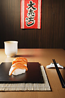 4 pieces of salmon sushi, nigiri - Asia Images Group