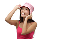 Young woman wearing pink hat and smiling - Asia Images Group