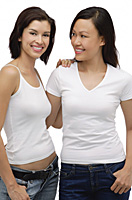 Two young women standing together and smiling - Asia Images Group
