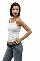 Young woman looking at camera with hands on hips - Asia Images Group
