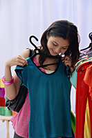 A teenage girl out shopping - Asia Images Group