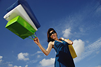 A young woman with shopping bags - Asia Images Group