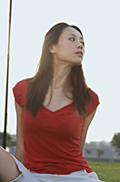 Woman looking into the distance - Asia Images Group