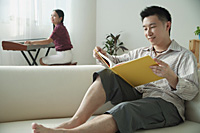 Couple relaxing at home - Asia Images Group