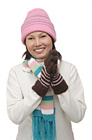Woman in winter clothing smiling at camera - Asia Images Group