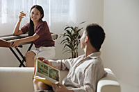 Couple relaxing at home - Asia Images Group