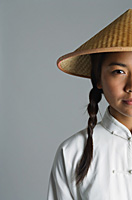 Young woman in traditional Chinese dress looking at camera - Asia Images Group
