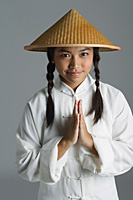 Young woman in traditional Chinese dress looking at camera - Asia Images Group